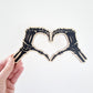 Skeleton heart hands