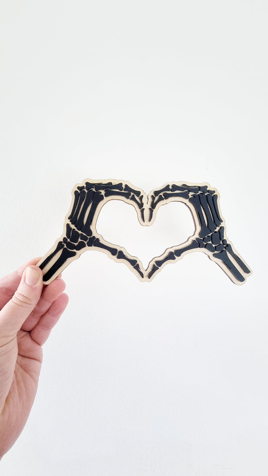 Skeleton heart hands