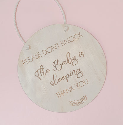 'Please don't knock' signs